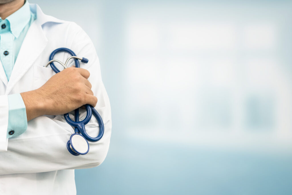 Doctor in hospital background with copy space